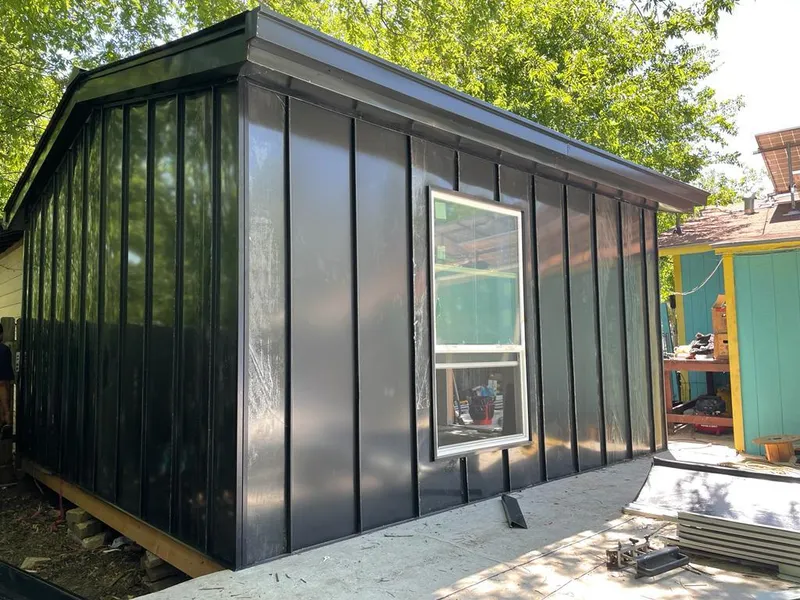 Black standing seam metal wall panels for Metal Roof Installation in South Boston